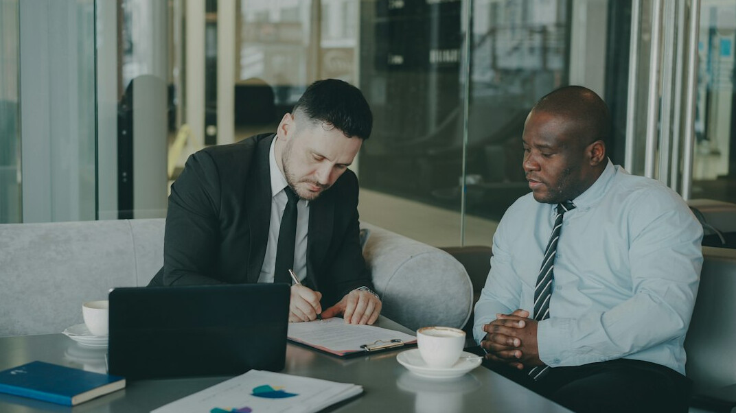 business team discussing contract