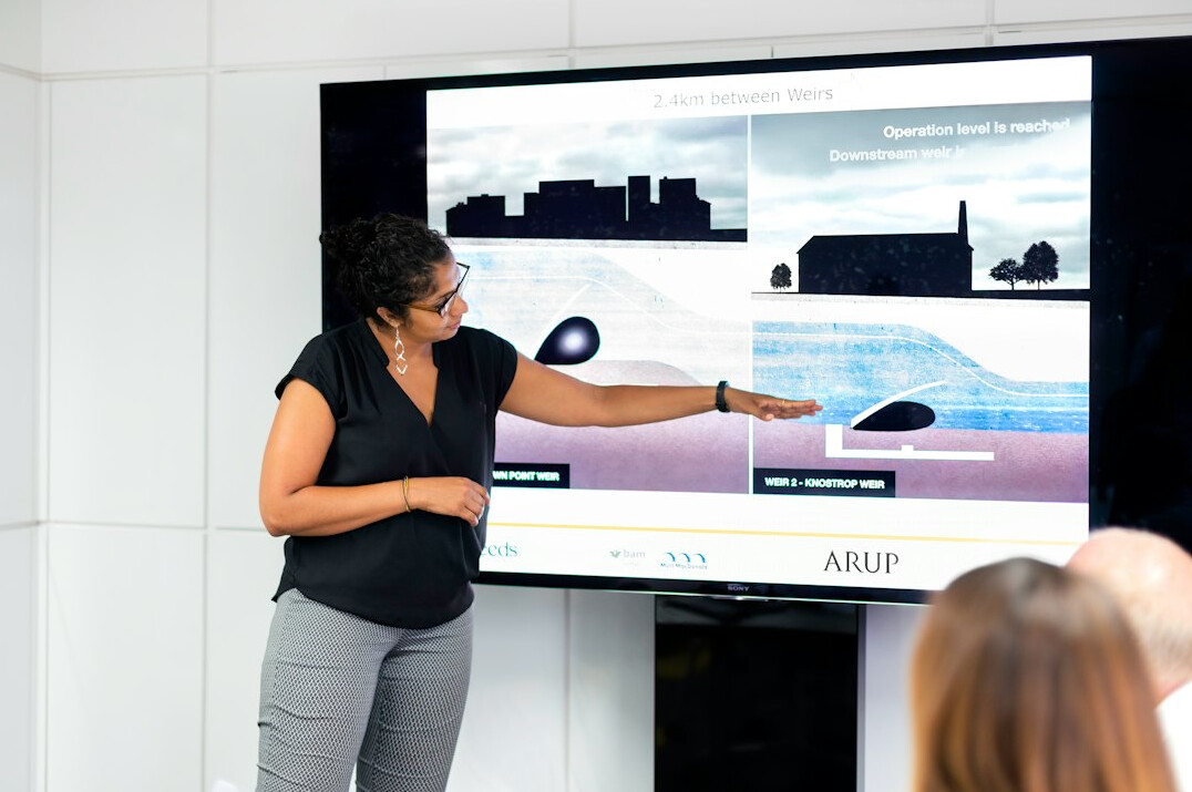 woman leading business presentation
